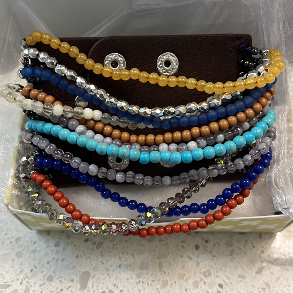 NWT - Plunder Bev Bravelet, 11 strands, multi-colored, adjustable leather snap